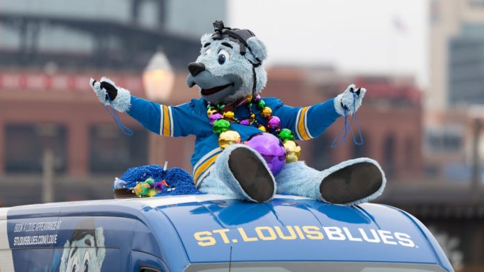 Louie, the mascot of DraftKings' new partner the St. Louis Blues, on top of a bus