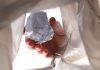 FanDuel & DraftKings throw out Nevada license applications A person throwing crumpled up paper into a garbage bag