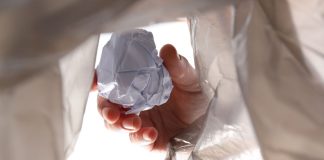 FanDuel & DraftKings throw out Nevada license applications A person throwing crumpled up paper into a garbage bag