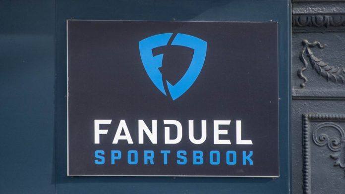FanDuel-Predicts-plans-to-launch-sports-contracts-in-December The FanDuel Sportsbook logo on a building in Chicago