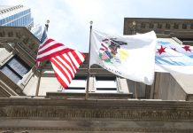 Illinois politicians call Chicago’s sports betting tax idea ‘deeply problematic’ The flags of the USA, the state of Illinois and the city of Chicago flying from a building