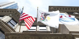 Illinois politicians call Chicago’s sports betting tax idea ‘deeply problematic’ The flags of the USA, the state of Illinois and the city of Chicago flying from a building