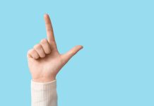 Hand making loser symbol