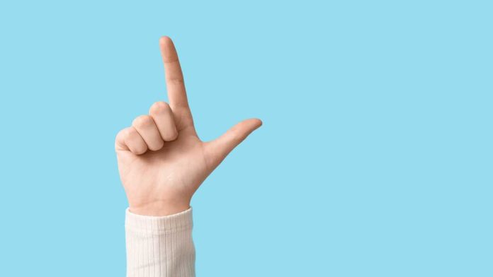 Kalshi-California-Injunction-Denial Hand making loser symbol