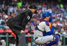 MLB and sportsbooks set bet limits on individual pitches An MLB umpire and a catcher wait for a pitcher to pitch