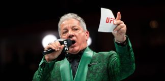 Polymarket mimics sportsbook odds integrations with UFC deal A UFC announcer holding a UFC-branded microphone and card before a fight
