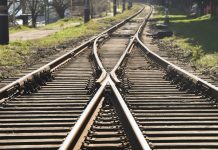 A railway track diverging into two tracks heading in different directions