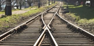 A railway track diverging into two tracks heading in different directions