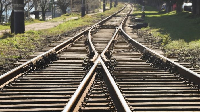 A railway track diverging into two tracks heading in different directions