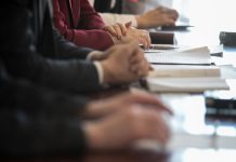 A committee sits as PENN received a committee report regarding its issues with HG Vora.