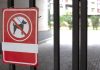 Arizona moves to revoke Underdog’s license over Crypto.com deal A sign showing that no dogs are allowed on the bars of a gate