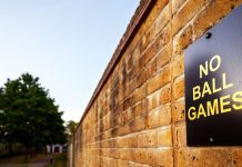 Crypto.com pulls sports contracts in several states amid pushback A sign on a brick wall stating that playing ball games in the area is not allowed