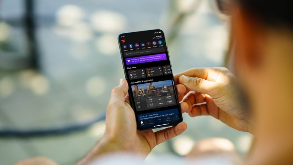 A bettor using the Fanatics Sportsbook app on their phone