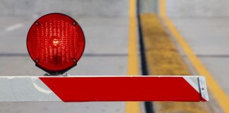 Florida bill seeks to ban all non-Seminole gaming in 2026 A barrier keeping people out of a certain area, with a red warning light