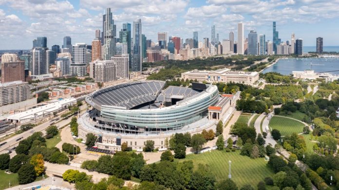 Illinois-made-$56M-in-sports-betting-tax-revenue-in-October An aerial view of Soldier Field, home to the Chicago Bears, looking towards the Chicago skyline in Illinois