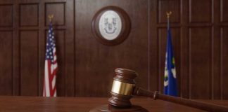 Kalshi takes Connecticut regulator to court over cease and desist letter Courtroom with US and Connecticut flagsI