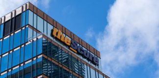 Longtime ESPN exec Ravitz to lead theScore media division theScore logo on the top of the company's Toronto office building