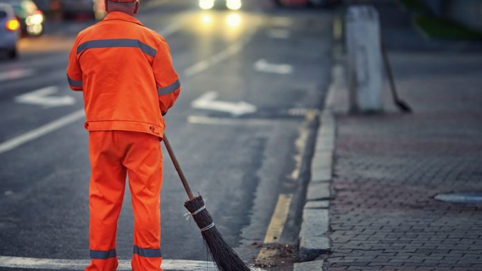 A person sweeping as Maine considers a ban on online sweepstakes games.