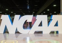 NCAA sign as president Charlie Baker talks prediction markets.