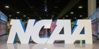 NCAA sign as president Charlie Baker talks prediction markets.