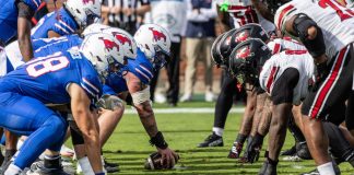 NCAA condemns Kalshi for readying transfer portal contracts SMU Mustangs and Louisville Cardinals players face off during a NCAA football game