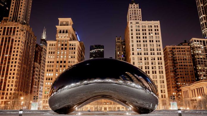 Chicago Bean sculpture and night skyline