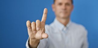 A person waving his finger as no new states passed sports betting bills in 2025.