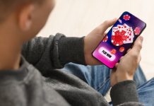 man playing online casino on phone