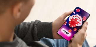man playing online casino on phone
