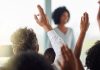 BetRivers makes second increase to minimum bet amount in Illinois A group of people raise their hands as BetRivers raises its minimum bet amount in Illinois.