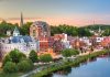 The Augusta, Maine, skyline on the Kennebec River at dusk