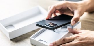 NCPG unveils new 1-800-MY-RESET national problem gambling helpline A person taking a brand new phone out of its box
