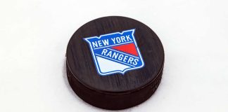Polymarket and NHL’s NY Rangers team up in new partnership Hockey puck with New York Rangers logo