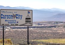A sign for Nevada capital Carson City, overlooking the city