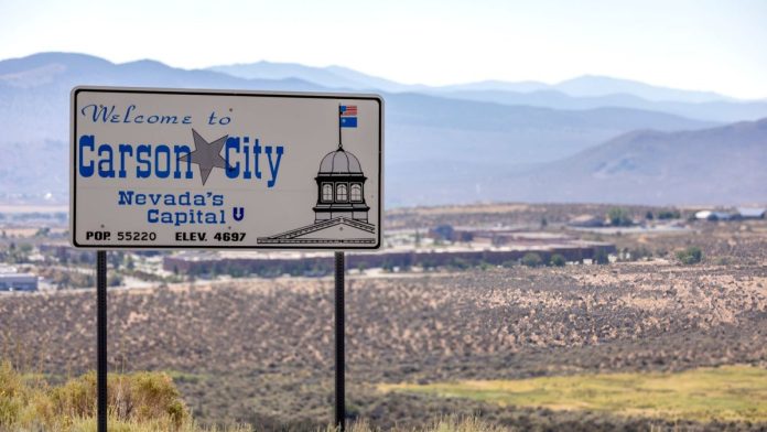A sign for Nevada capital Carson City, overlooking the city
