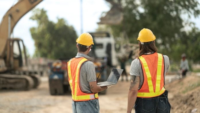 North-Carolina-Tribe-Lumbee-Tribe-Casino-Plans-Land-Purchase Construction workers as a tribe in North Carolina considers casino development plans.