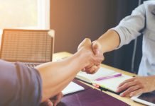 People complete a deal as Allwyn completes its acquisition of a majority stake in PrizePicks.