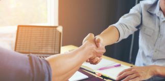 People complete a deal as Allwyn completes its acquisition of a majority stake in PrizePicks.