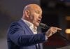 UFC CEO Dana White speaking at a podium