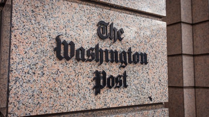 The Washington Post logo as the Coalition for Prediction Markets publishes a full-page ad in the newspaper.