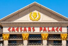 Caesars enjoys big digital gains as it holds back from prediction markets A close-up view of the front of Caesars Palace casino in Las Vegas