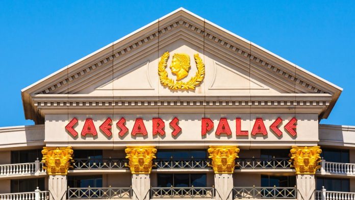 Caesars-enjoys-big-digital-gains-as-it-holds-back-from-prediction-markets A close-up view of the front of Caesars Palace casino in Las Vegas