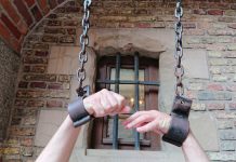 Dina Titus’ federal bill latest legislative effort to shackle prediction markets A person's arms in shackles