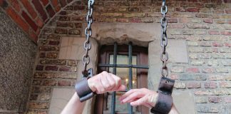 Dina Titus’ federal bill latest legislative effort to shackle prediction markets A person's arms in shackles