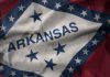 Arkansas flag as DraftKings and FanDuel launch online sports betting in the state.