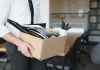 DraftKings cutting jobs in company-wide restructuring A person packing up their office as DraftKings is set to undergo a series of layoffs.