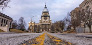 Illinois lawmaker starts again down long road to legalizing online casinos Road road leading to the Illinois State Capitol Building in Springfield, Ill.
