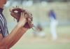 A baseball pitcher as ESPN reports a bigger gambling scheme for MLB pitcher Emmanuel Clase.