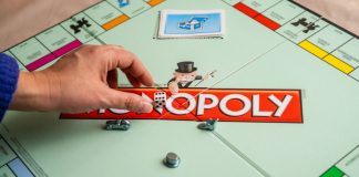 Monopoly board as PENN CEO Jay Snowden takes issues with the framework of Maine's online casino market.