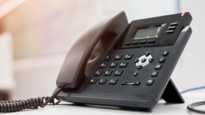 NCPG-Board-Call-Prediction-Markets-Helpline A phone as the NCPG calls on prediction markets to use its gambling helpline.